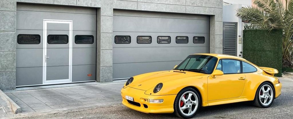 Panels with windows as design options for roller doors