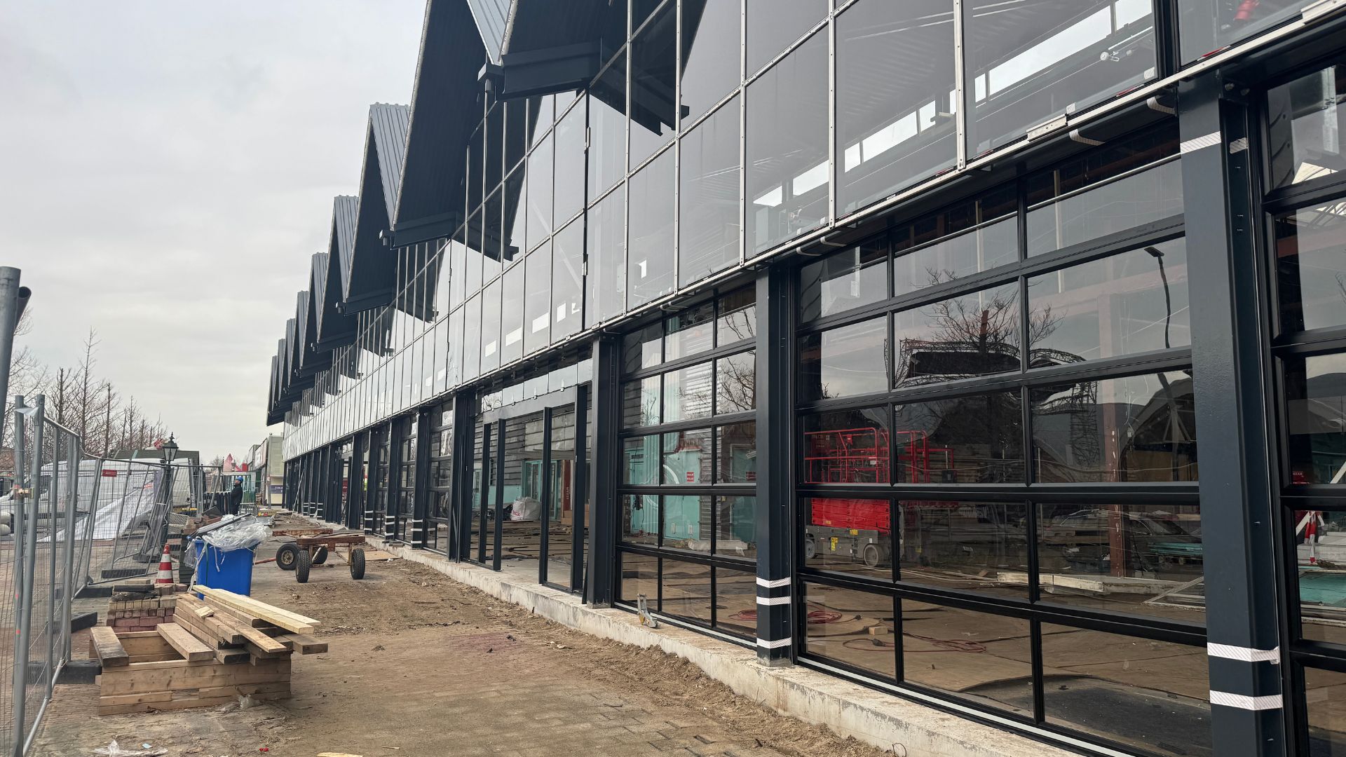 Black frames around the glass panels of the Compact door