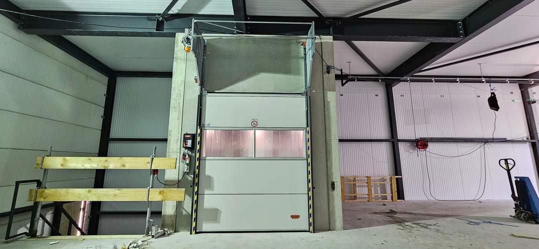 Compact elevator door in industrial bakery