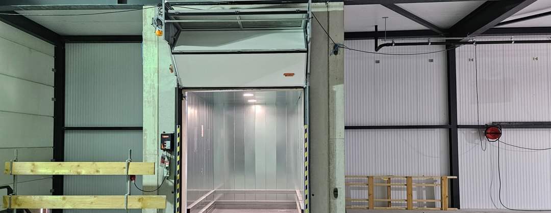 Compact folding elevator doors - space saving